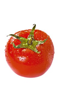 Fresh juicy tomato isolated over white