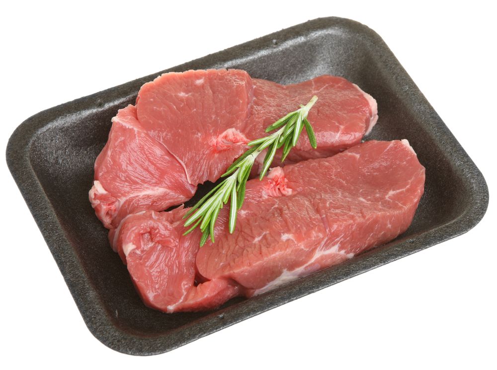 Raw lamb leg steaks in styrofoam tray
